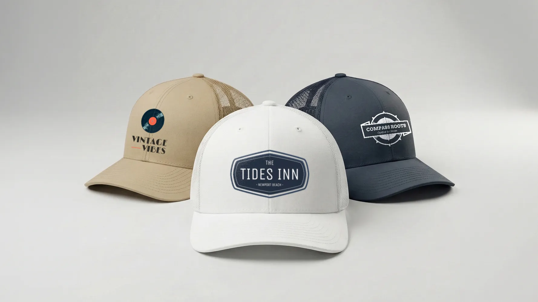 Three custom trucker caps with printed logos